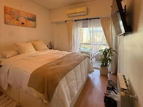 Departamento tres ambientes con cochera - Venta