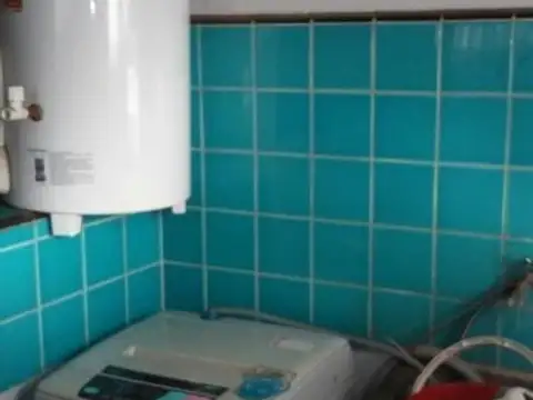 CASA TRES AMBIENTES + DEPARTAMENTO DOS AMBIENTES + LOTE