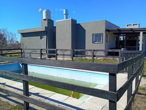 FINANCIA 100 %  casa EXCELENTE estado a 400 Mts LAGO Potrero de Garay
