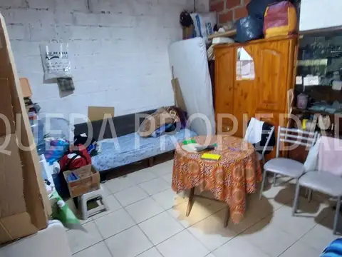 CASA CON LOCAL ANTIGUA  SOBRE LOTE 8 X 18 MTS