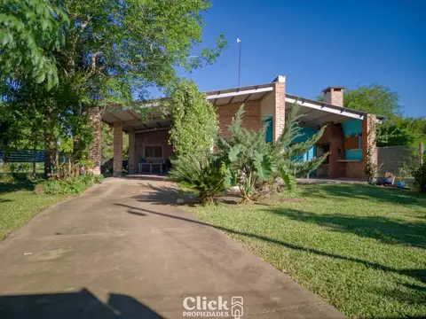 Casa en venta en Altos Verdes, Puerto Tirol – 2 dormitorios y jardín parquizado