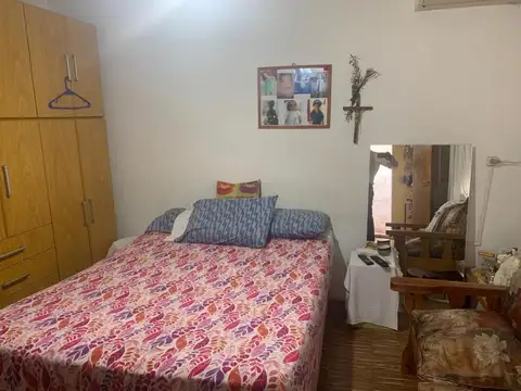 CASA 2 DORMITORIOS CON GARAGE FONDO Y PATIO