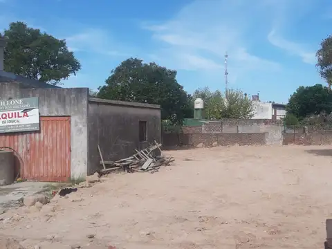 TERRENO CENTRICO 600 M2  CON CASA Y GARAGE USO COMERCIAL