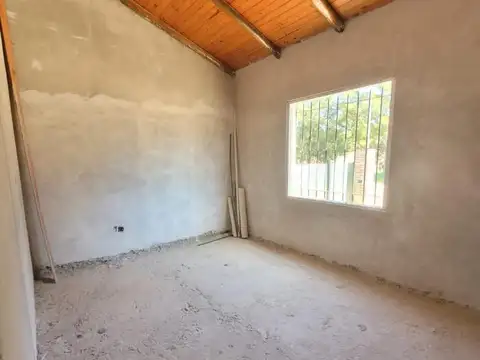 Lote en excelente zona con construcción a terminar
