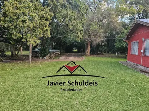Chacra 1,7 has, con mejoras, zona Cuartel 8. Apta. Crédito 