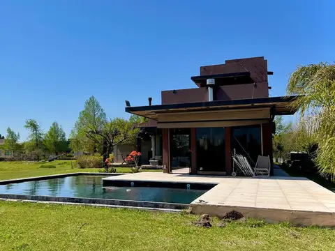 Casa en alquiler en barrio Cerrado Puerto Roldan