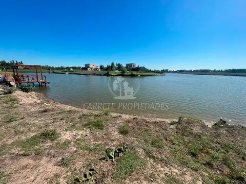 RETASADO! Lote en venta al agua en Area 10. Escriturado. Barrio San Sebastián. 100