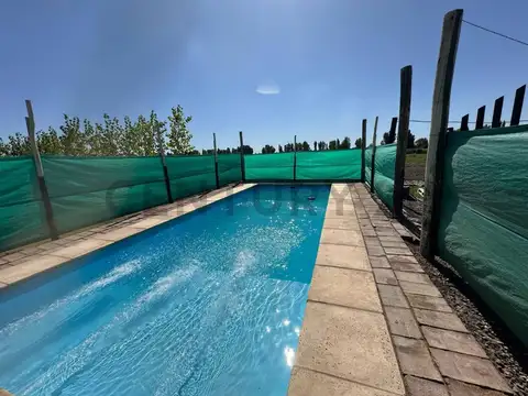 TERRENO CON QUINCHO Y PILETA EN VENTA EN GUAYMALLEN