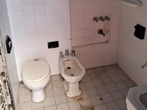 Alquiler local-casa por pasillo al fondo