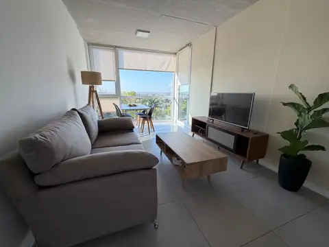 Departamento en Zte. con dos dormitorios en torre Al Rio en alquiler