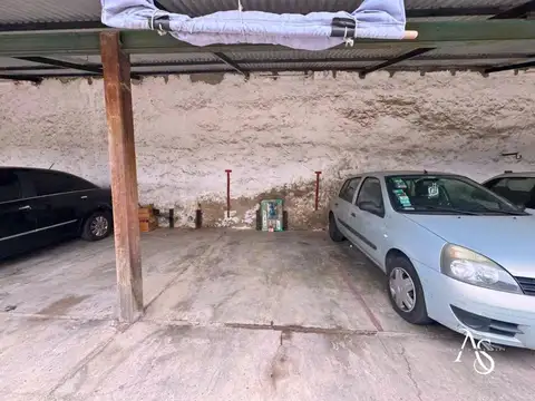 cochera en venta   en centro de casero frente a la municipalidad