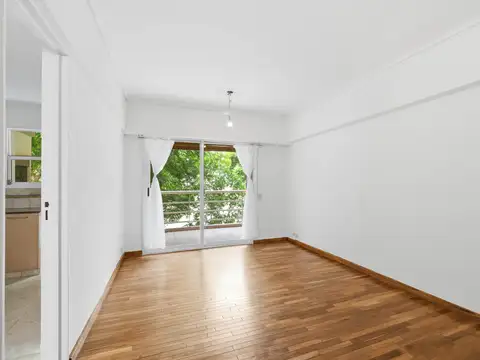 Venta departamento 2 ambientes muy luminoso con cochera, balcon y parrilla. Apto credito