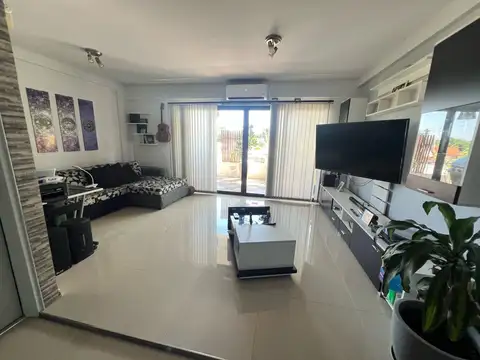 Departamento de 3 ambientes con cochera y baulera