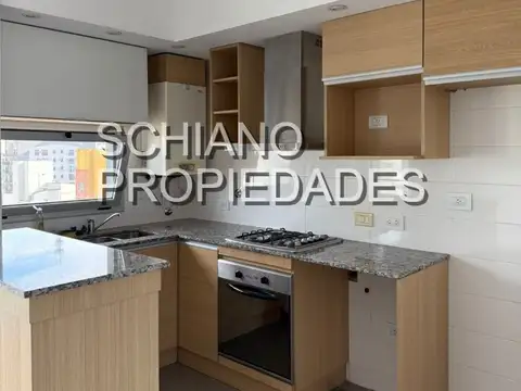 DEPARTAMENTO DE DOS AMBIENTES CON COCHERA . EDIFICIO CON SUM, QUILMES CENTRO. APTO CREDITO.