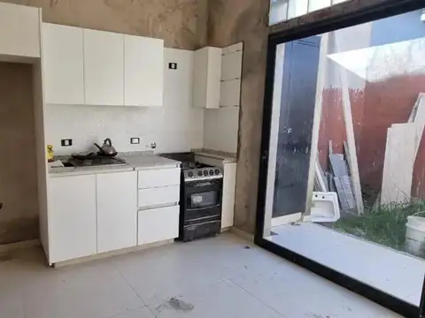 Casa 2 ambientes con 2 baños