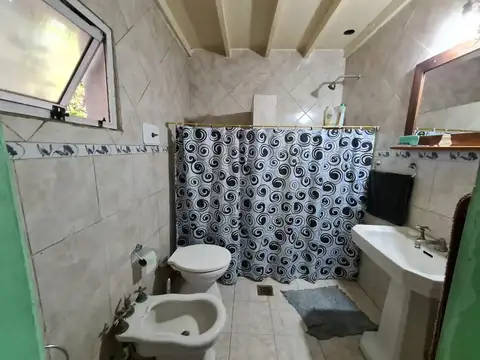 Casa 2 ambientes con 2 baños