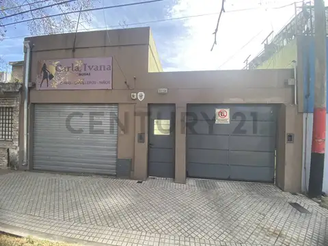 Casa con local comercial