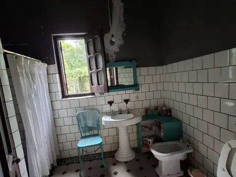 Chacra de 6.000 m2 con casa de 4 dormitorios