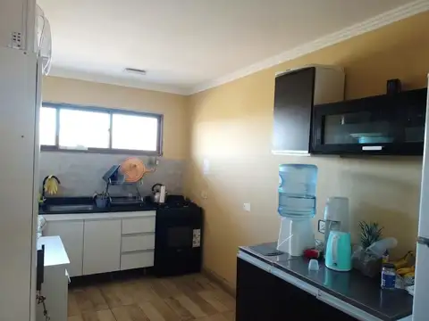 Casa 2 ambientes con 2 baños
