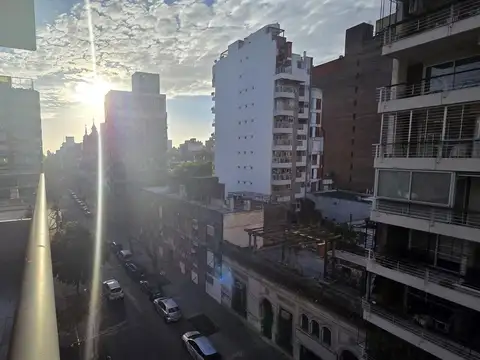 Departamento al frente, dos dormitorios con cochera en alquiler
