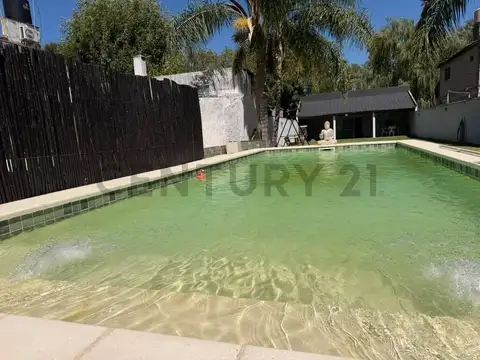 QUINTA CON CASA PILETA Y QUINCHO PARQUIZADA