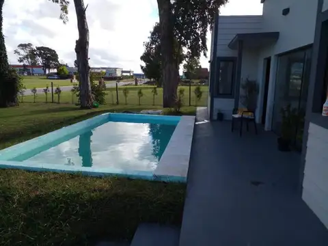 CASA CON PILETA Y GRAN PARQUE EN BARRIO CERRADO LA AURELIA
