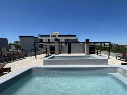 VENTA DEPTO 2 DORMITORIOS CON COCHERA FRENTE U.N.C